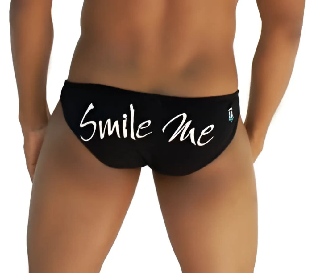 Black swim trunks with smile me in white cursive on the back from Icker Sea slip bikini underwear COI-13-15