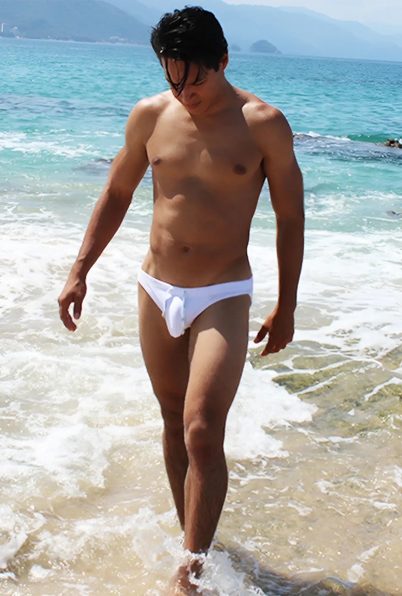 White swim trunks from icker sea spring bikini swimwear with a brief low-rise cut and central front panel