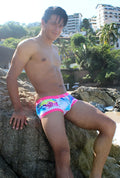 Icker Sea Spring square cut trunk swimwear in vibrant pink and blue with tropical print and bright pink trim