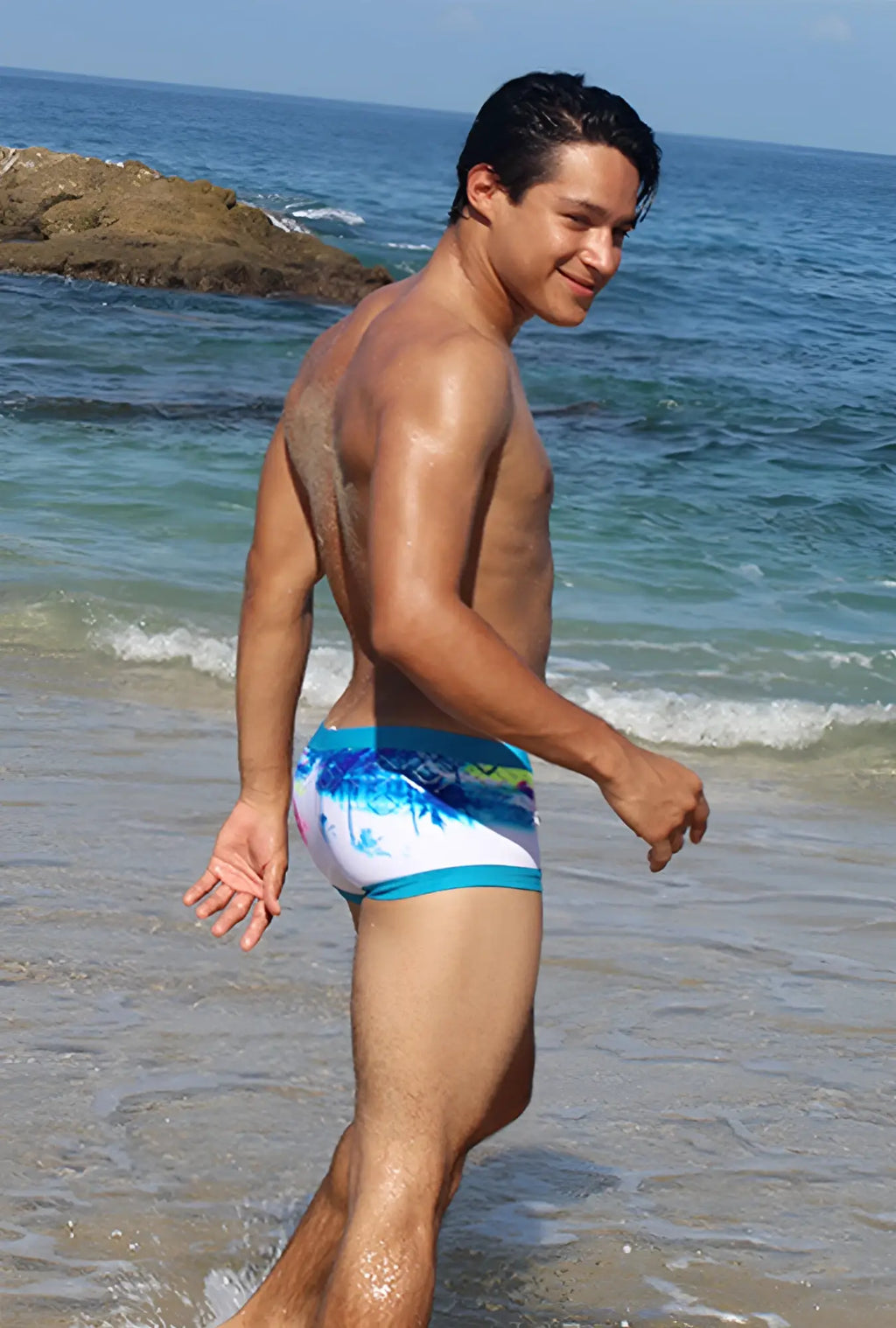 Icker Sea spring square cut swim trunks in pink and blue with blue and white tropical pattern for beachwear