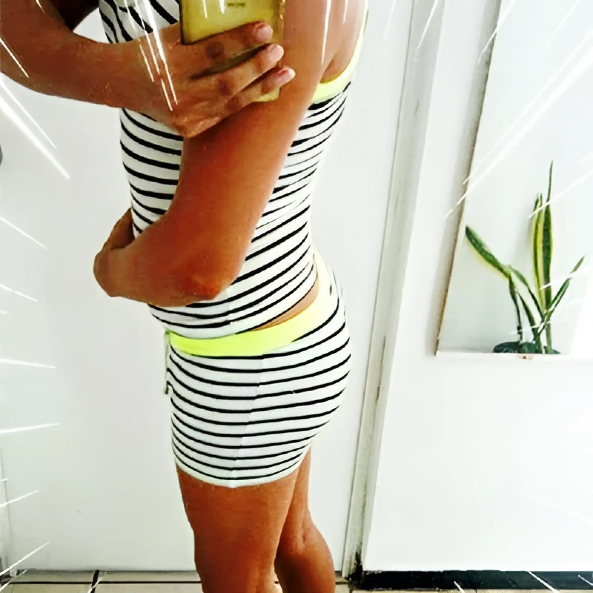Icker Sea stripe lines black and white striped microslip bikini shorts with neon yellow waistband for athletic use
