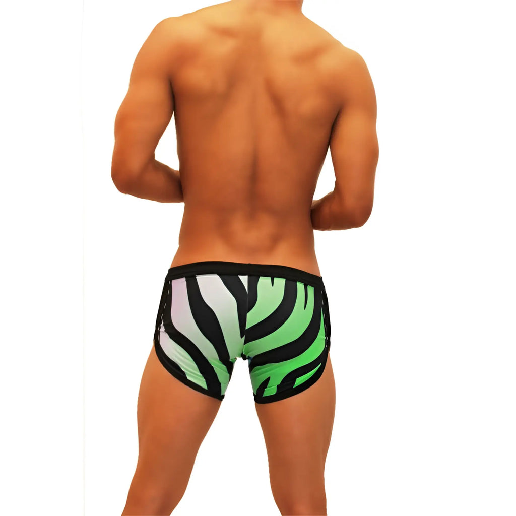 Icker Sea zebra open side suspender scalloped shorts swimwear green black zebra-striped sleek form-fitting trunks