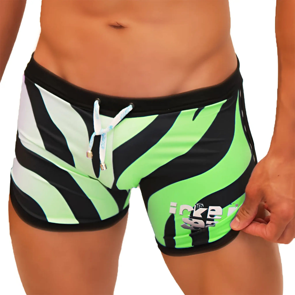 Icker Sea zebra open side suspender scalloped shorts swimwear in vibrant neon green and black zebra stripes with a white drawstring