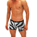 Icker Sea Zebra open side suspender scalloped mens swim trunks in black and white zebra stripes with black waistband and drawstring