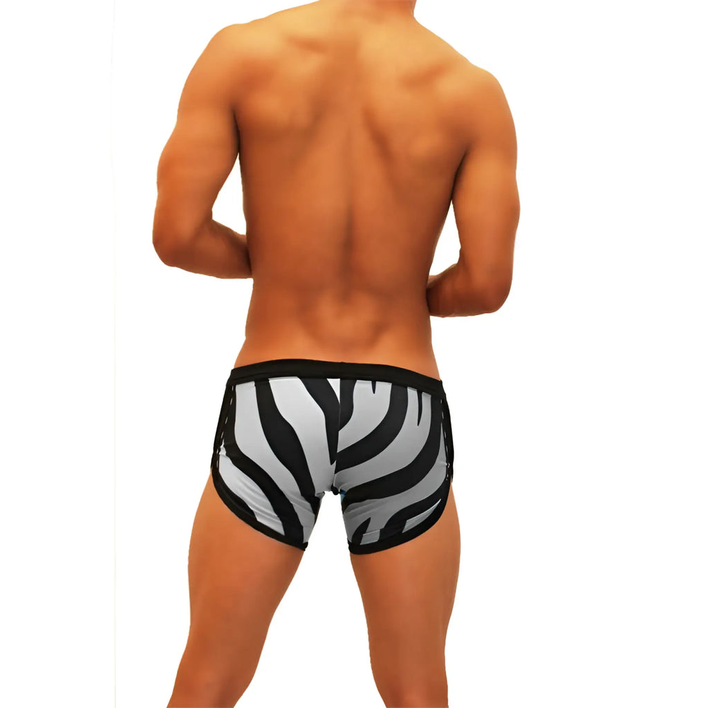 Icker Sea Zebra open side suspender scalloped men’s swim trunks in black and white zebra stripe with a snug fit