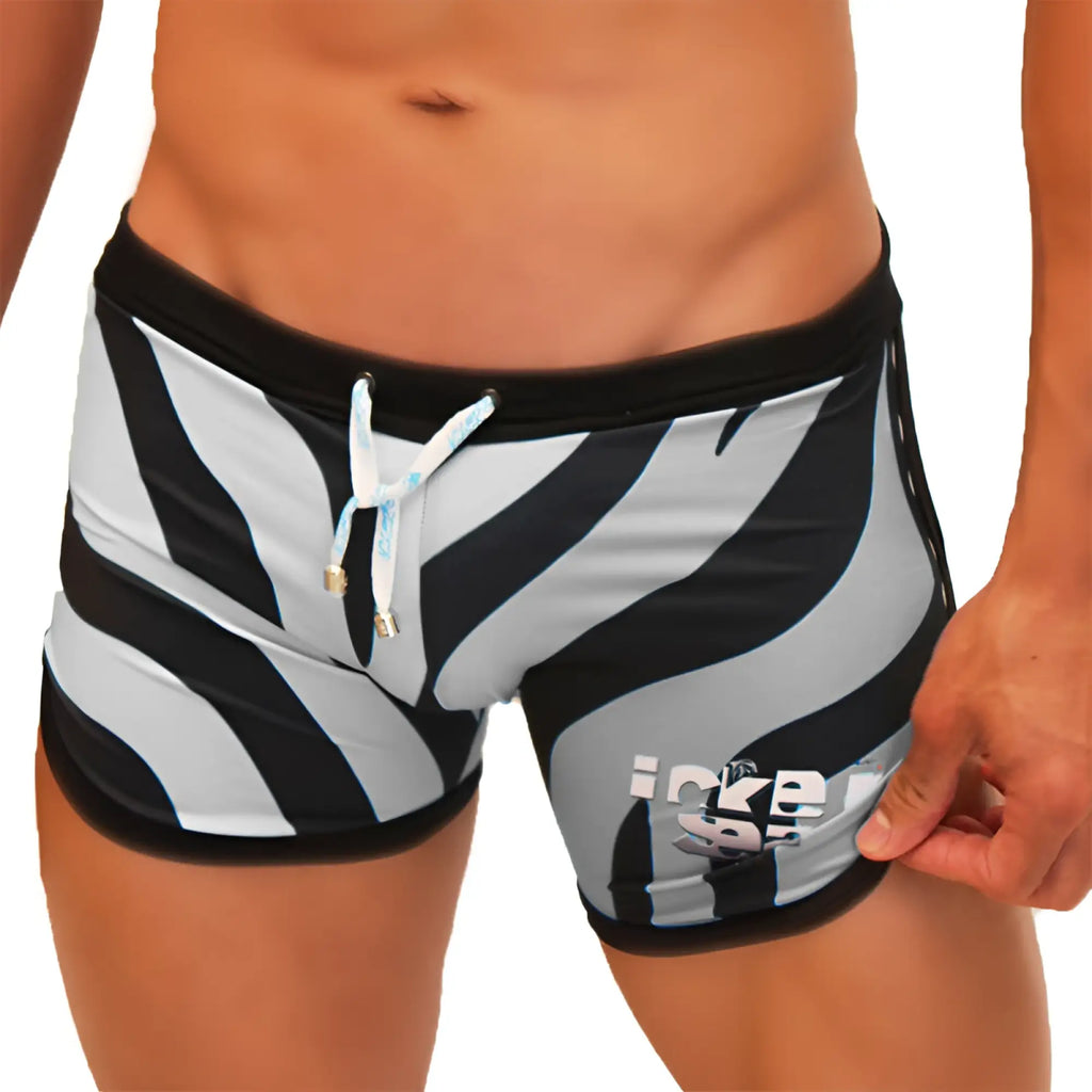 Icker sea zebra open side suspender scalloped shorts swimwear in black and white zebra stripes with black waistband and blue drawstring