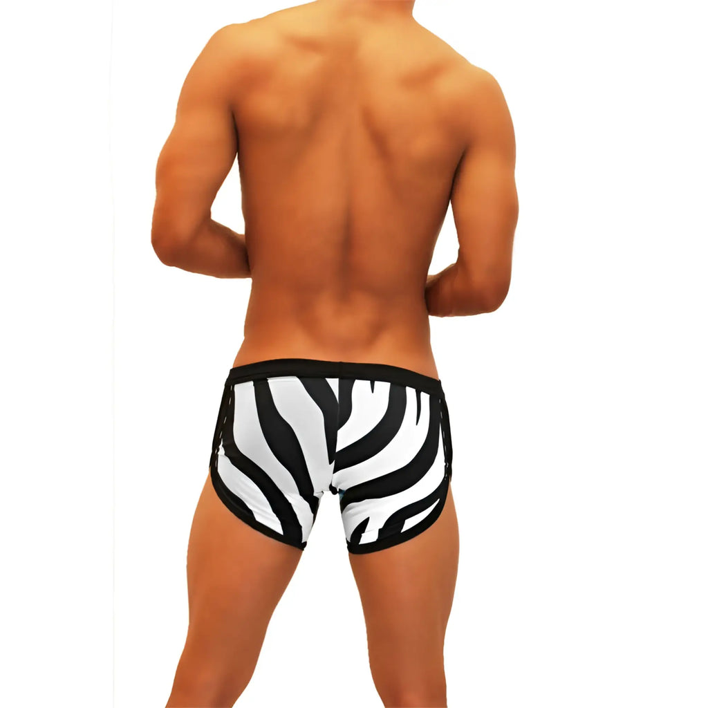 Icker Sea zebra open side suspender scalloped swim trunks in black and white with a sleek fitted design