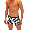 Icker Sea zebra open side suspender scalloped swim shorts in black and white zebra stripes with black waistband and blue drawstring