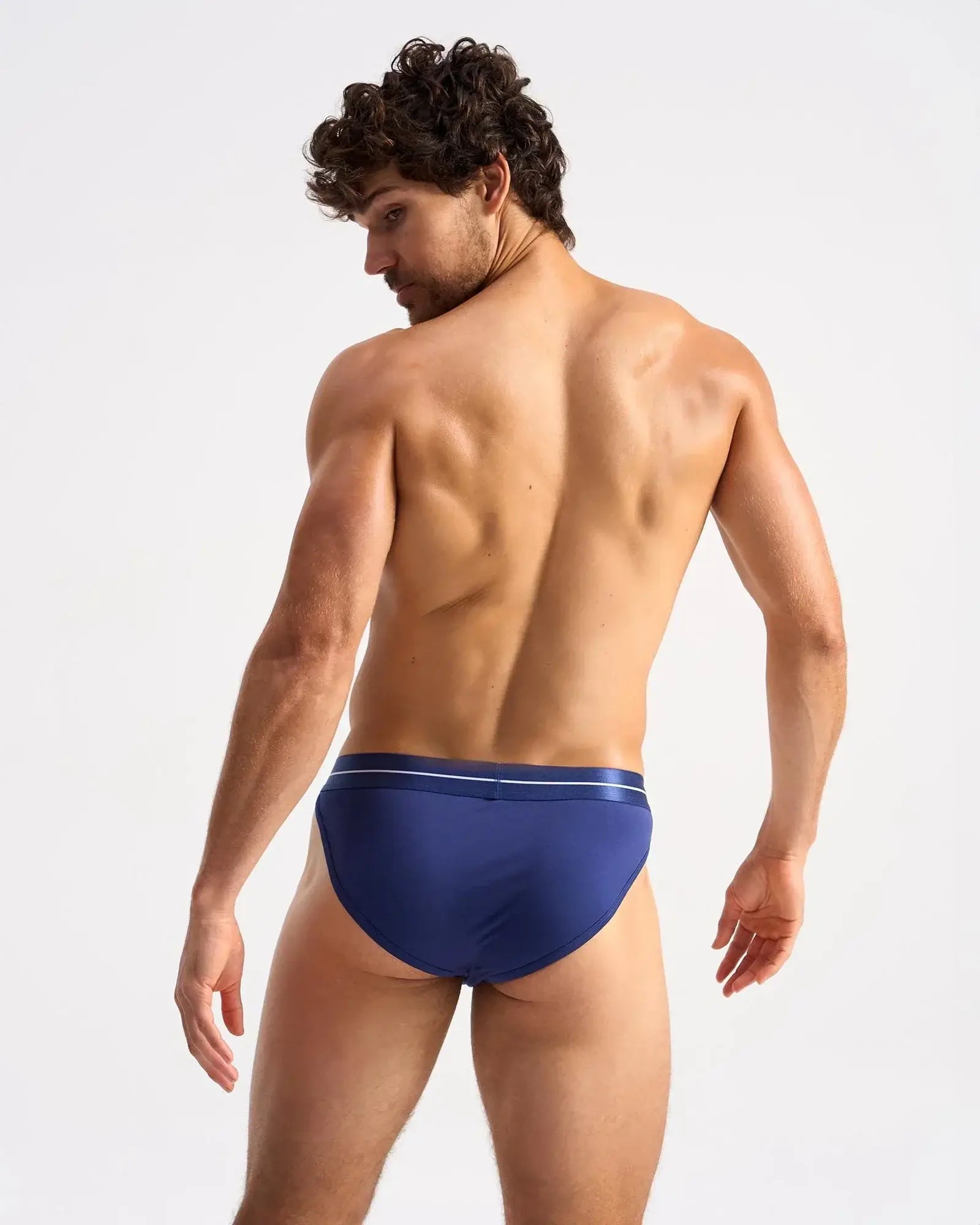 Navy blue icon sports brief with subtle white stripe waistband designed for athletic comfort and support