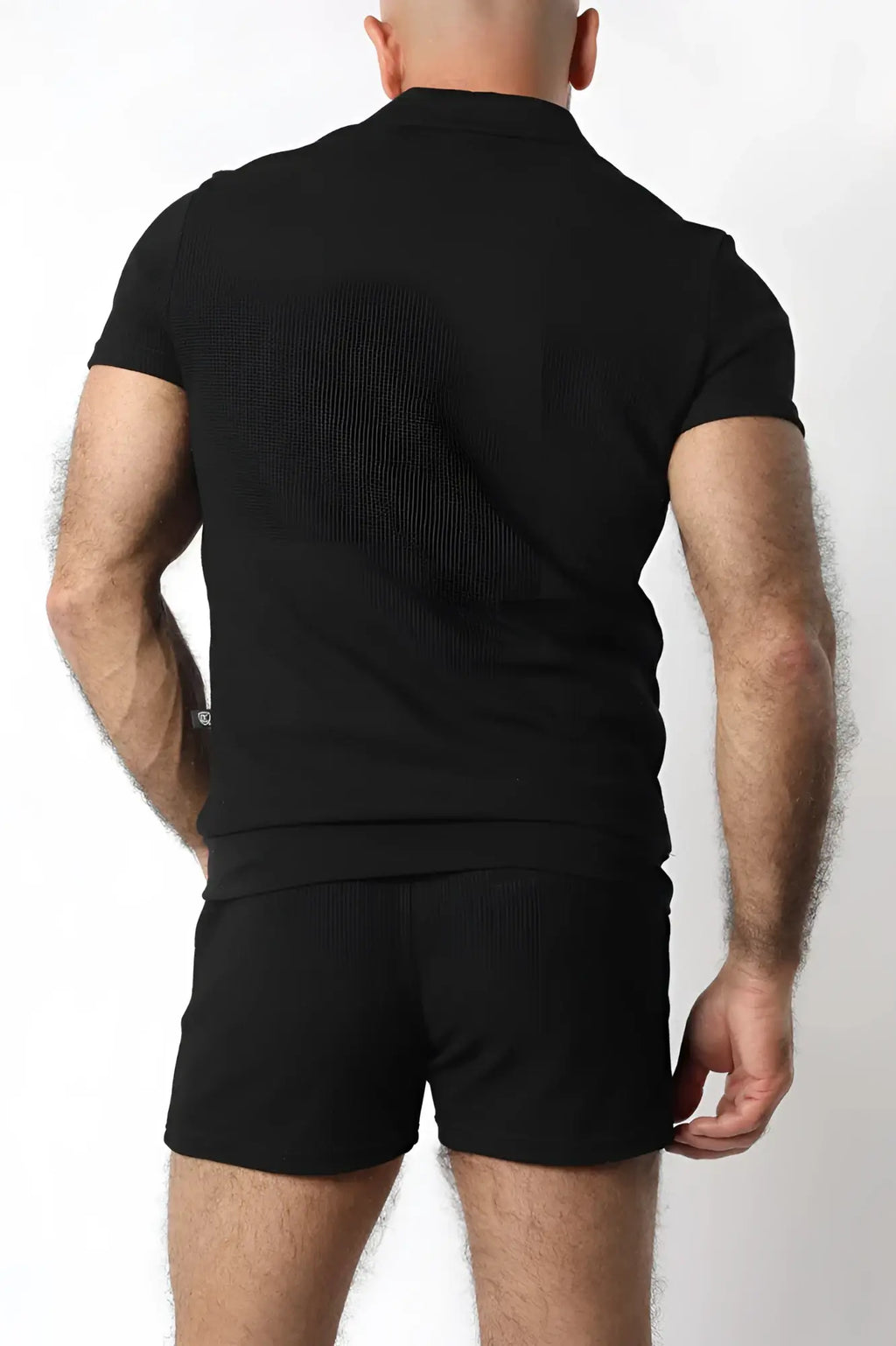 Indio knit short black polo shirt with ribbed texture and collar perfect for casual or smart casual wear