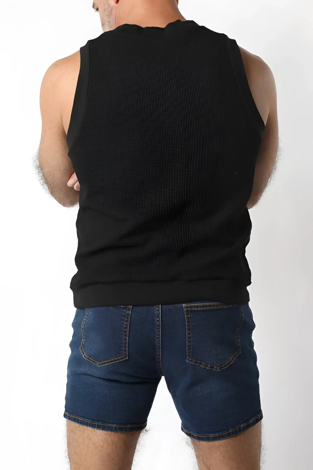 Black ribbed knit sleeveless indio knit tank top showcasing a fitted textured fabric perfect for layering or warm weather wear