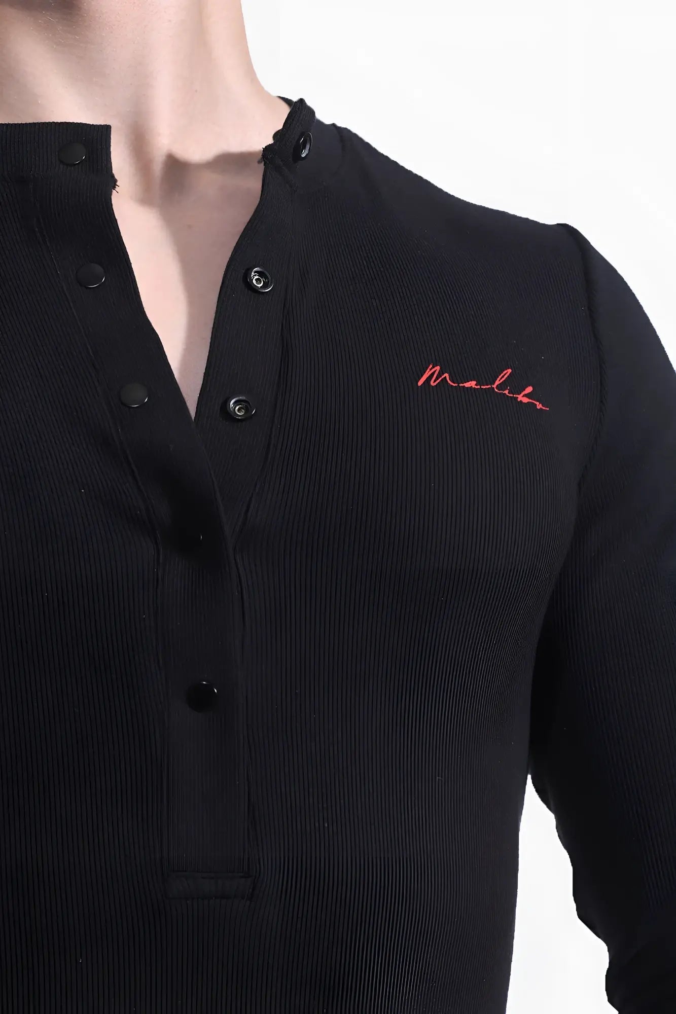 Infinity long sleeve button up bodysuit in midnight black ribbed fabric with black buttons and red malibu logo on chest