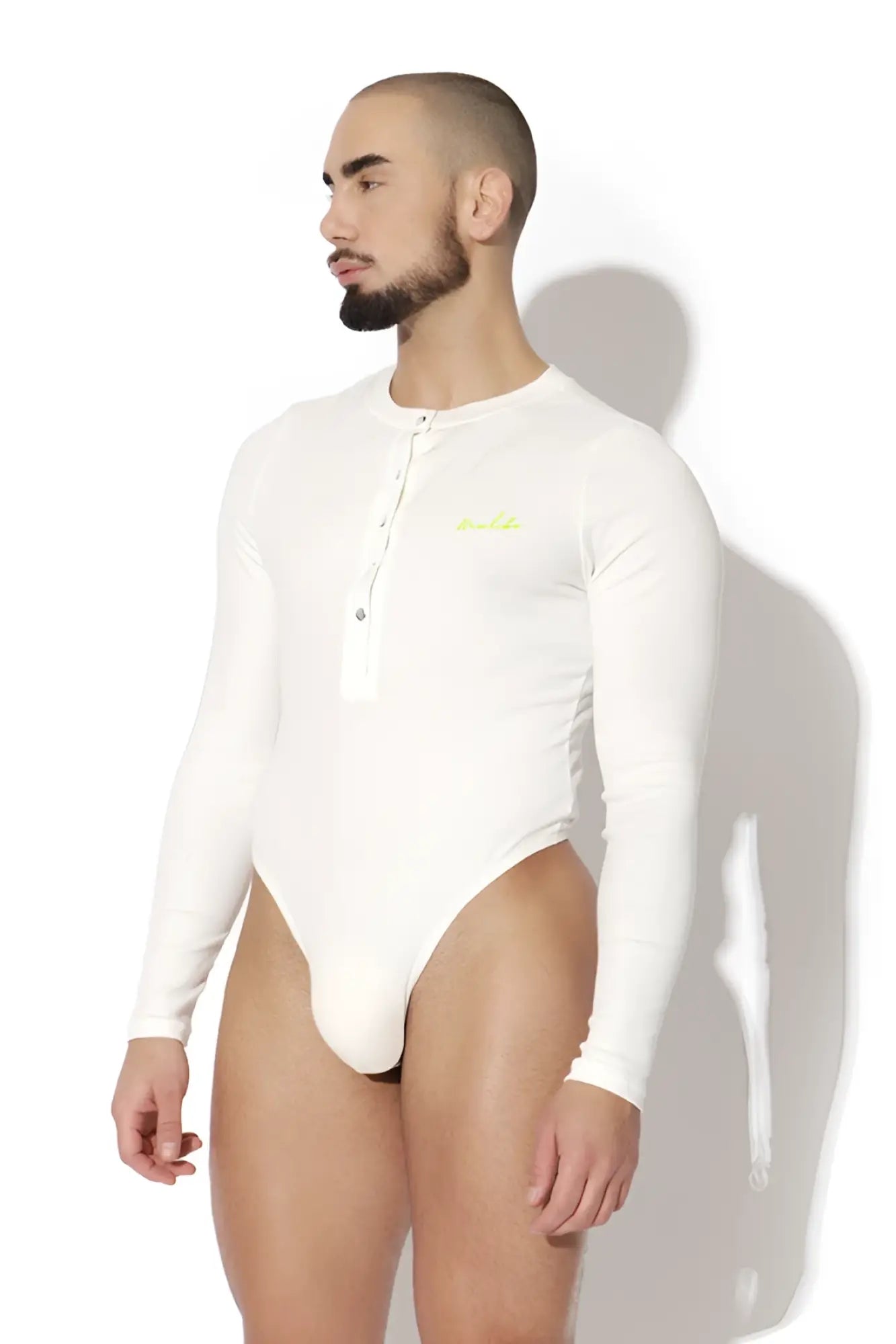 White long-sleeve infinity button up bodysuit with buttoned front and neon green logo on the chest