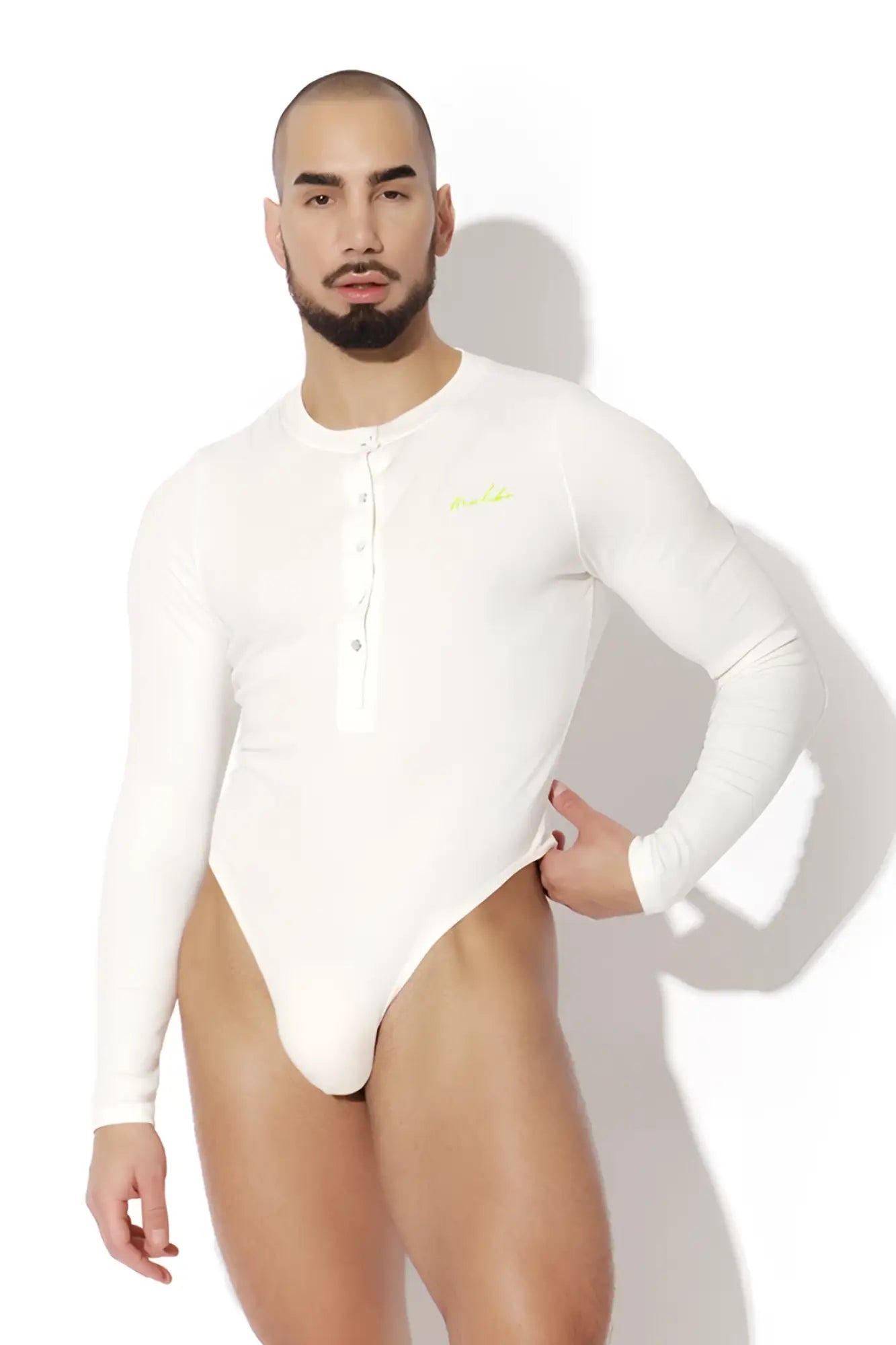 White infinity long sleeve button up bodysuit with button-front neckline and neon green logo on chest