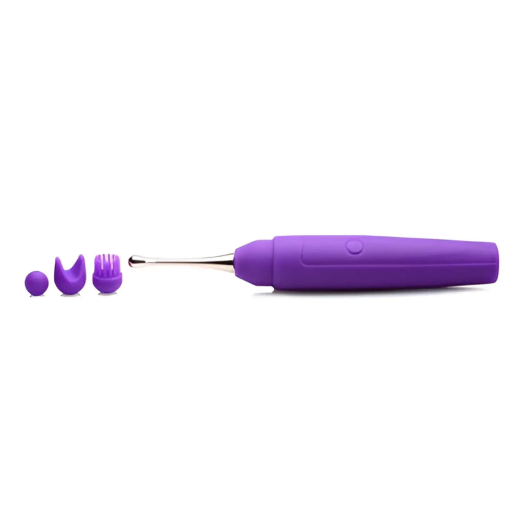 Inmi 10X En Pointe purple silicone pinpoint teaser with a metallic tip and three distinct purple silicone attachments.