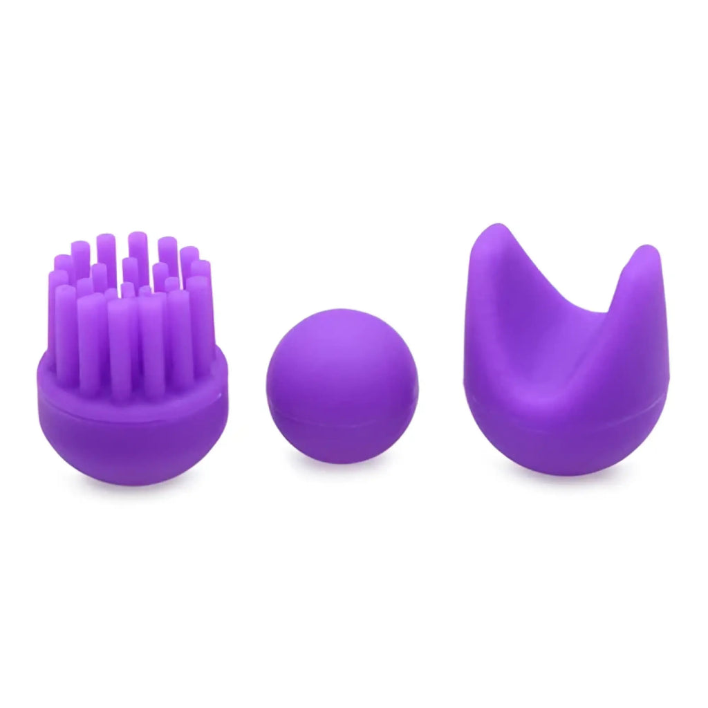 Inmi 10X En Pointe: Three purple silicone massager attachments (spiked, spherical, and U-shaped) on white background.