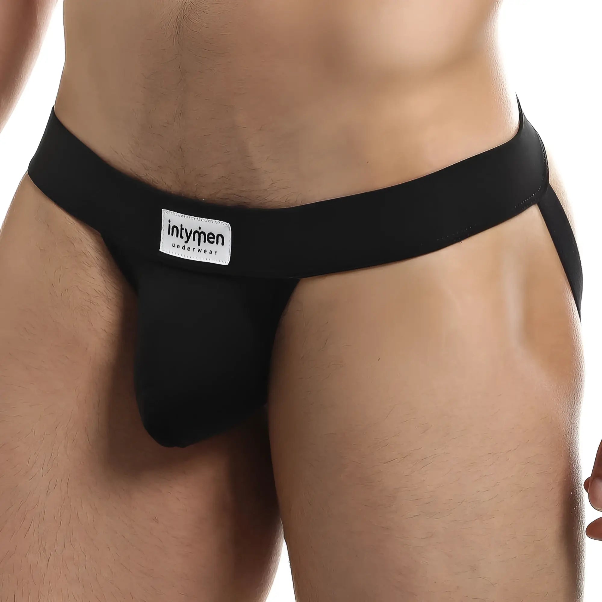 Black Intymen INE020 jockstrap with smooth form-fitting design and branded label on the waistband front side