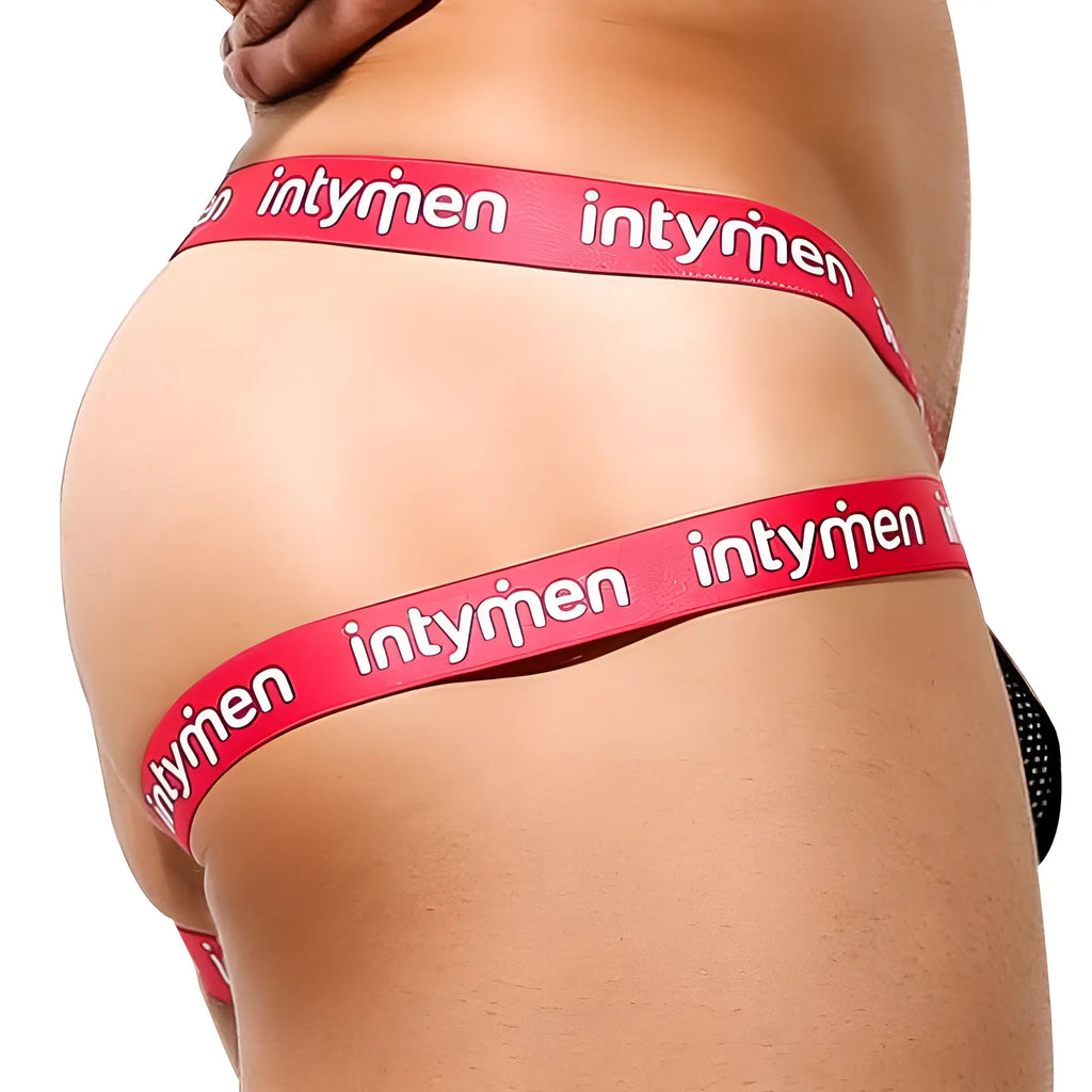 Red Intymen branded men’s briefs with white lettering in a jockstrap style designed for support and comfort