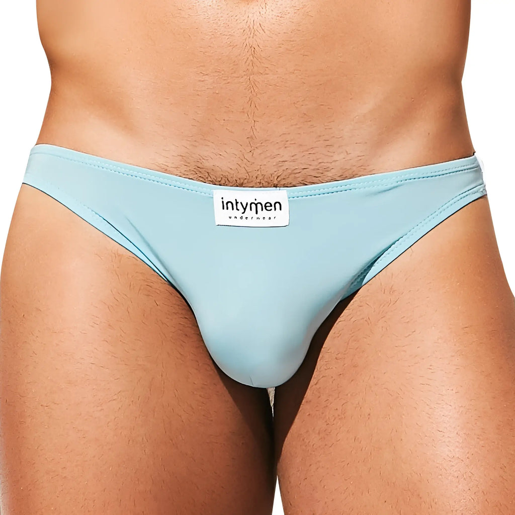 Light blue smooth-textured men’s briefs with white intymen underwear label at waistband from Intymen INE027 jockstrap