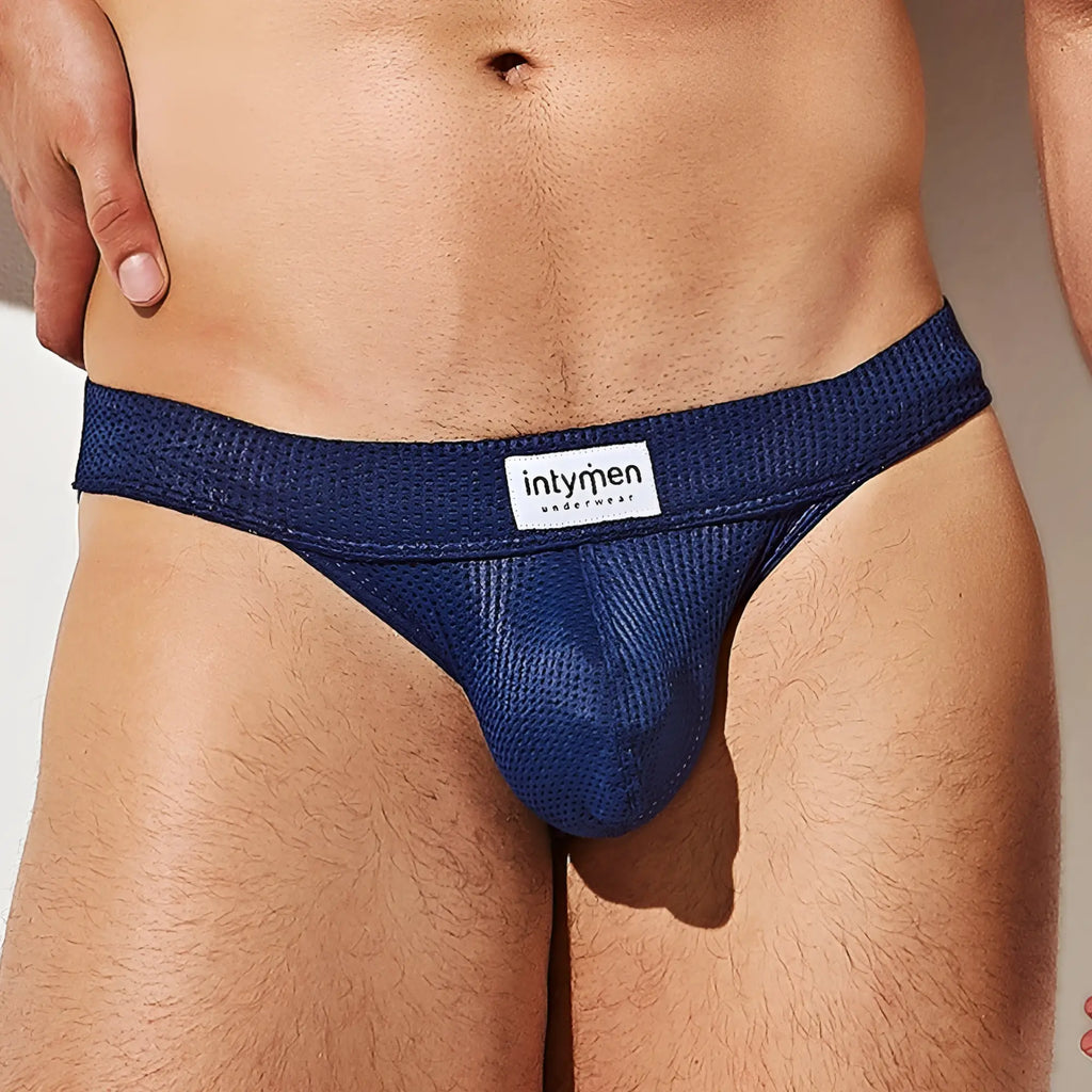 Navy blue mesh jockstrap briefs with white intymen underwear label on waistband in Intymen INE028 design