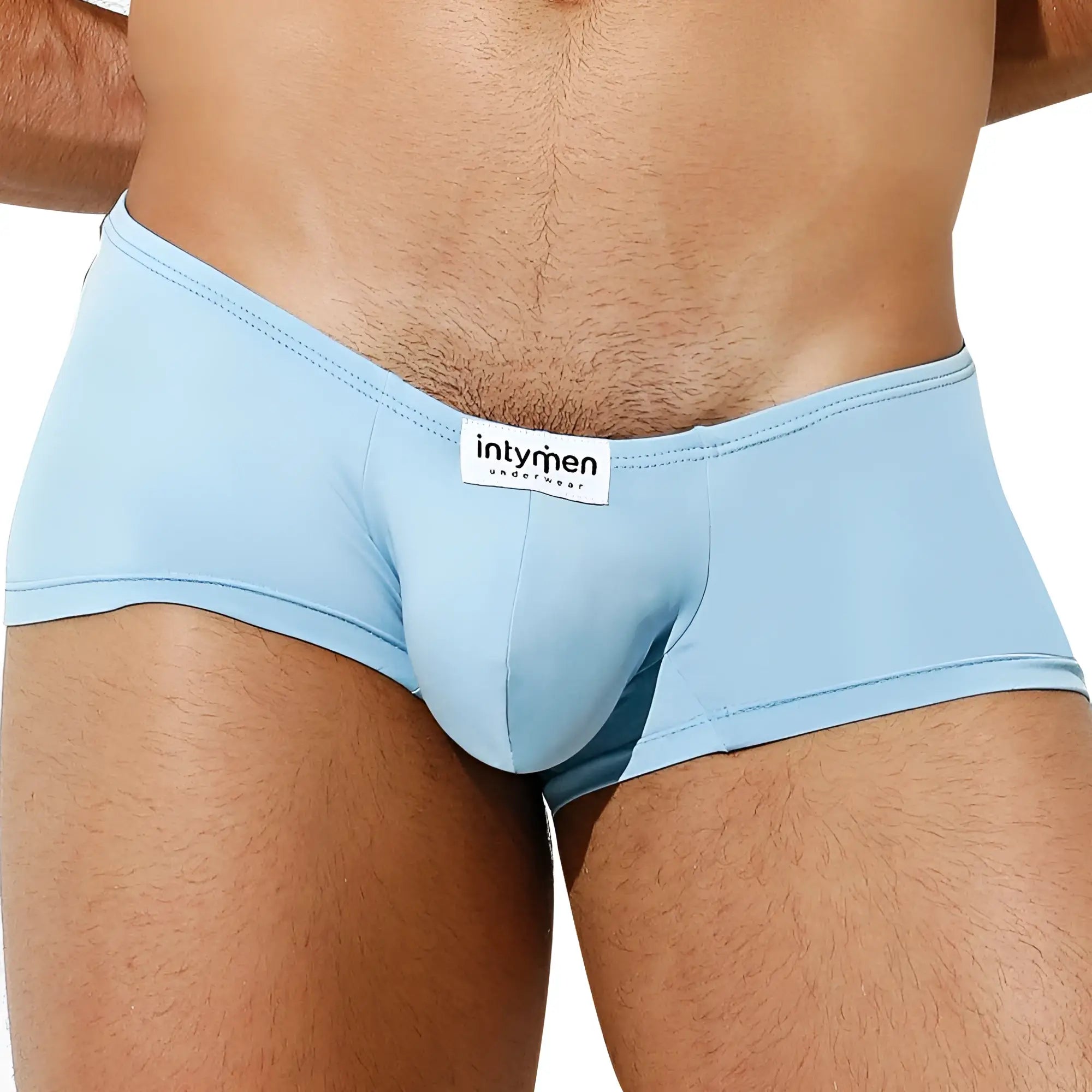 Light blue form-fitting men’s briefs with a white intymen underwear label on the waistband from Intymen ING071 boxer trunk