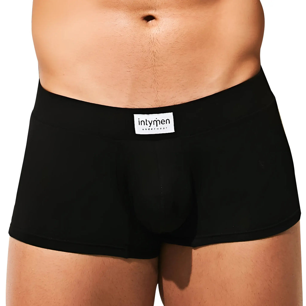 Black men’s briefs with white intymen underwear label on waistband from intymen ing074 boxer trunk collection