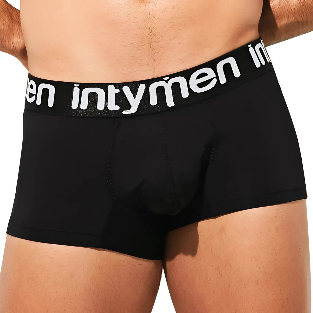 Black men’s briefs with white intymen logo on waistband in Intymen ING076 boxer trunk design