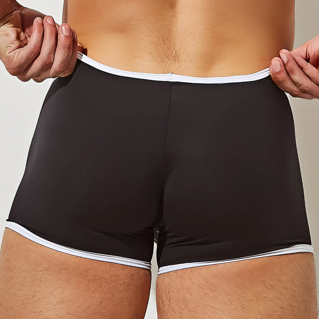 Black briefs with white trim by Intymen ING082 boxer brief offering comfortable fit and breathable material
