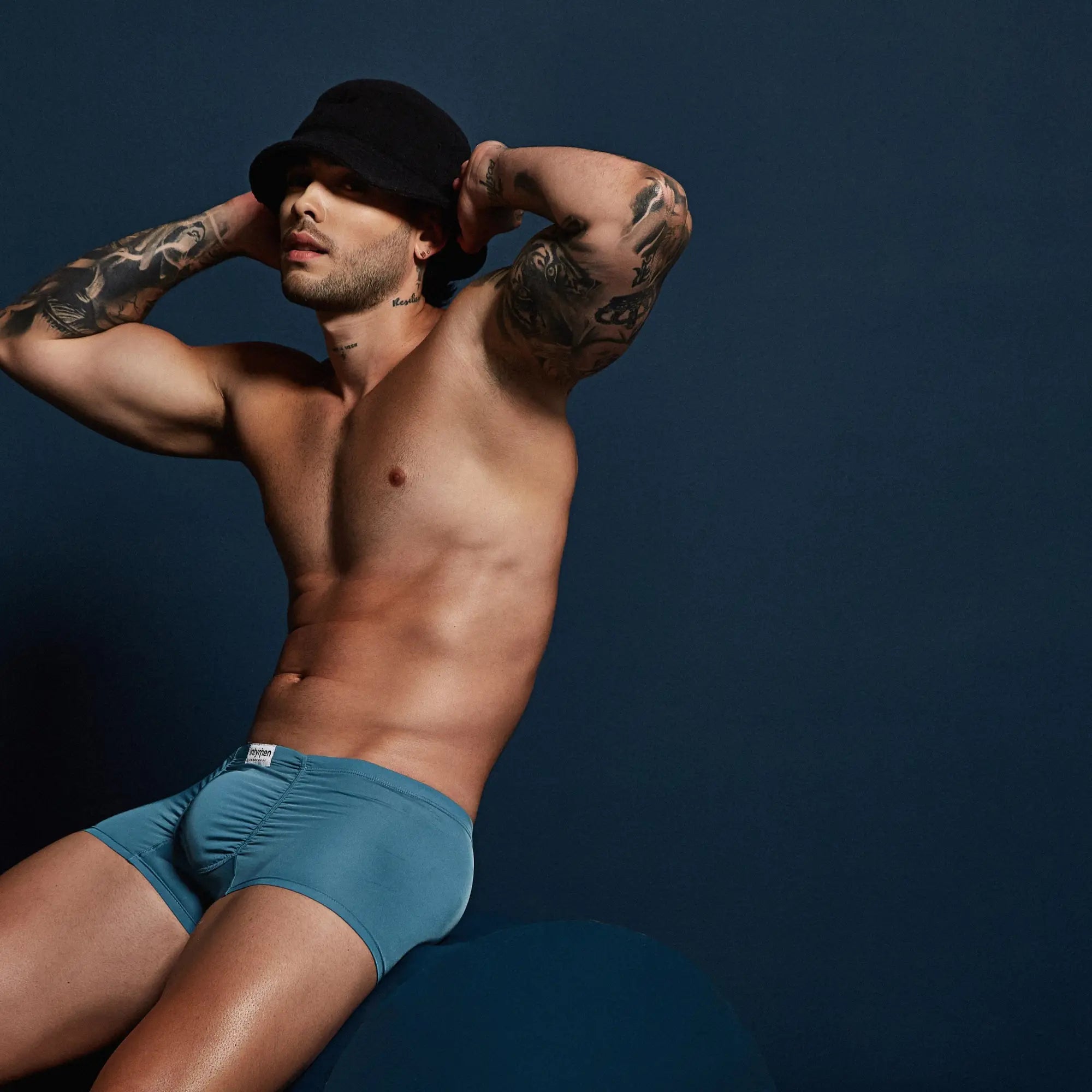 Blue men’s briefs intymen ing092 boxer with small white brand tag on waistband made from soft breathable fabric