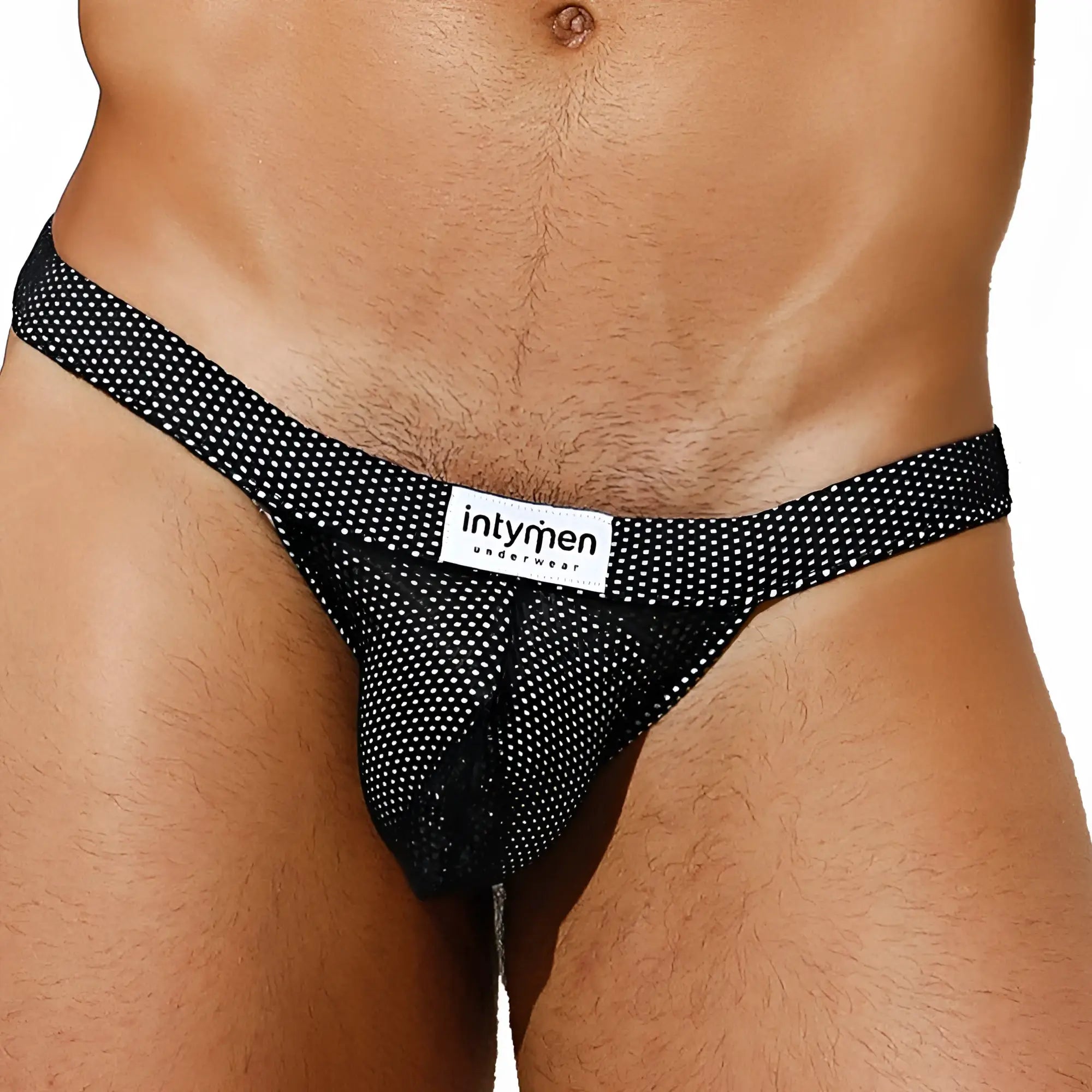 Black mesh thong bikini brief with white polka dots and Intymen branded label in front view