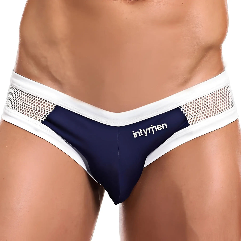 Navy blue and white mesh-trimmed men’s briefs by Intymen INJ055 featuring breathable fabric and branded waistband