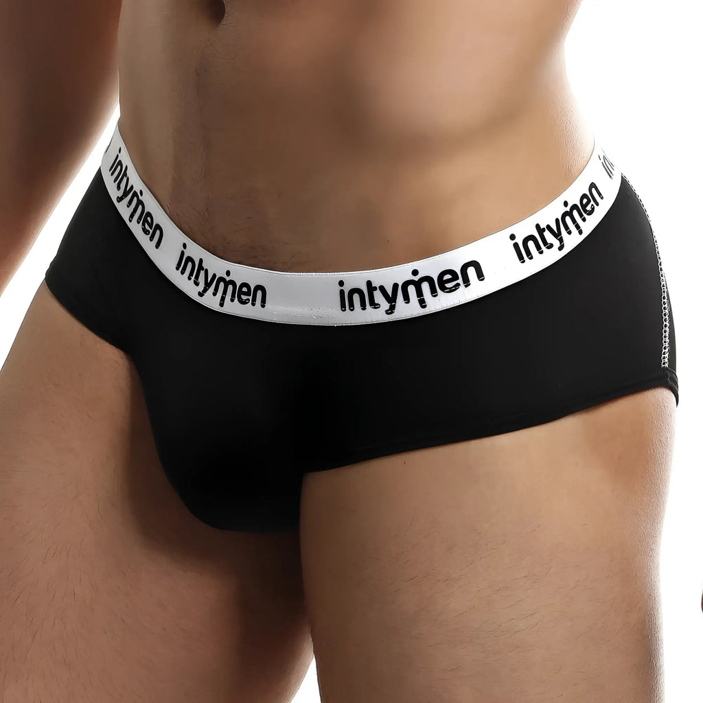 Black intymen INJ059 brief with white elastic waistband and black branded lettering front view underwear brief