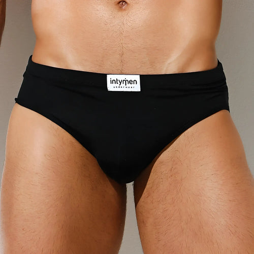 Black Intymen INJ065 brief underwear with white label on waistband designed for comfortable daily wear