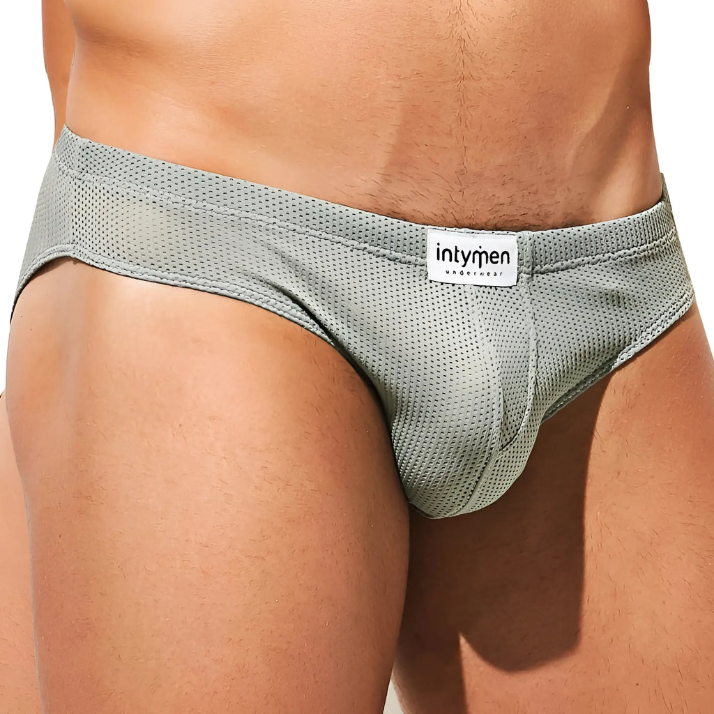 Gray mesh briefs with a white intymen underwear label designed for comfort and breathability in the inj078 brief
