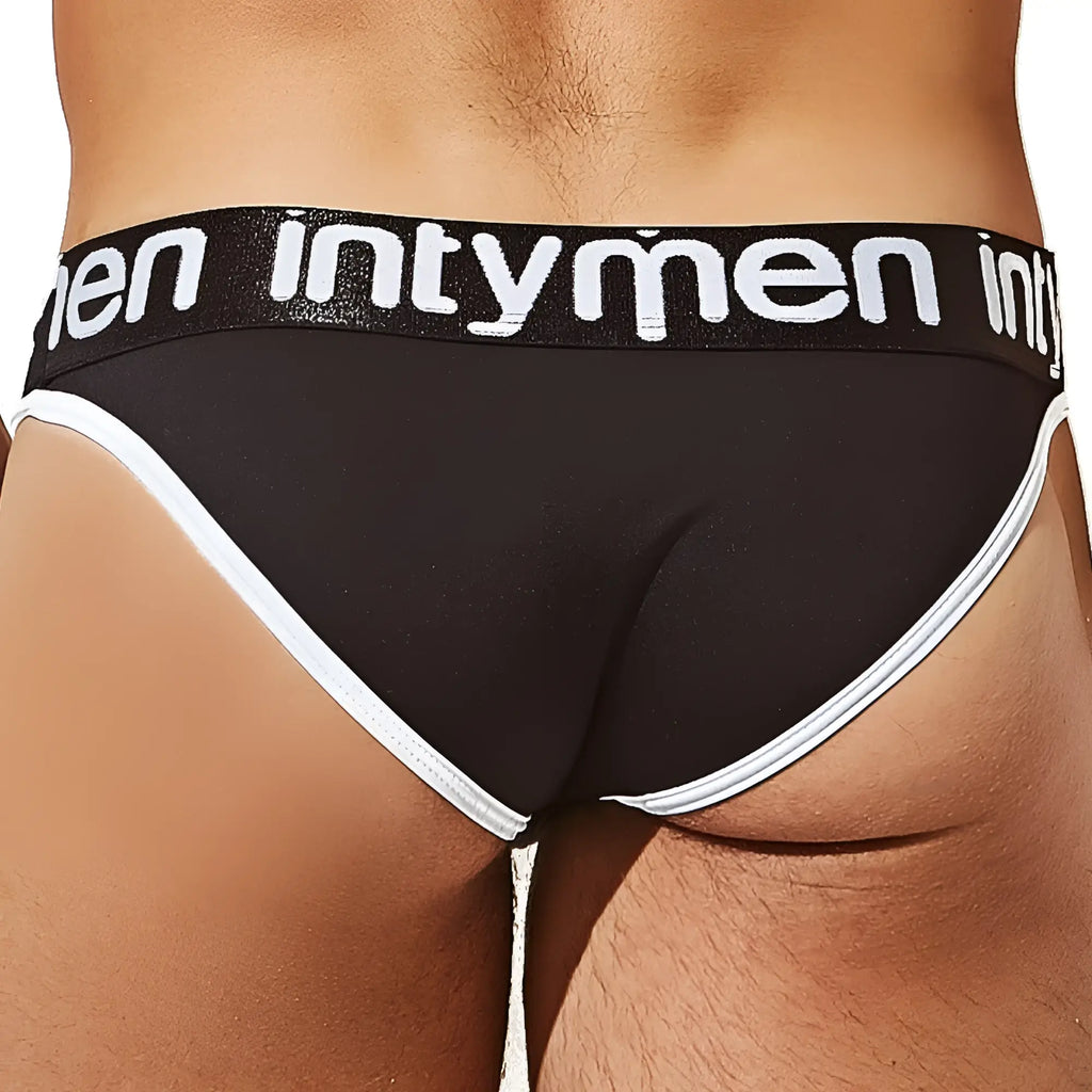 Black men’s bikini briefs with white trim and intymen branded waistband in cotton blend material