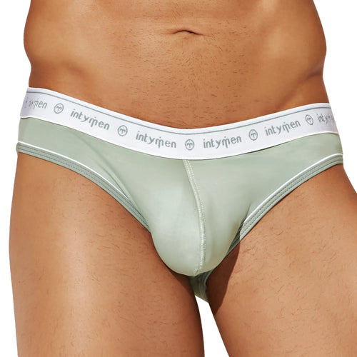 Mint green intymen inj086 brief with white elastic waistband featuring intyrien brand name and logo repeated