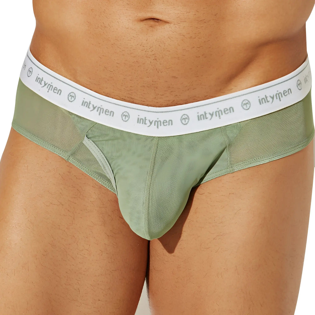 Mint green mesh briefs with white elastic waistband featuring intymen logo from Intymen INJ087 brief collection