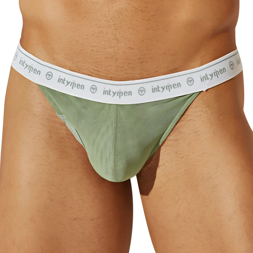Mint green mesh briefs with white elastic waistband featuring intymen logo and emblem in intymen INK016 thong