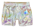 Iridescent rave shorts featuring a shiny holographic surface that shifts between white pink and gold hues