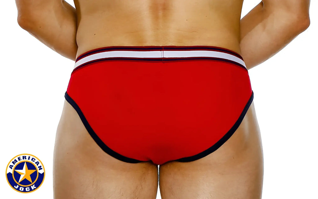 A j aktivo hi cut brief in red american jock style with black and white trim for athletic support
