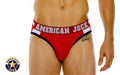A j aktivo hi cut brief in red with white and black trim featuring a bold american jock logo on the waistband