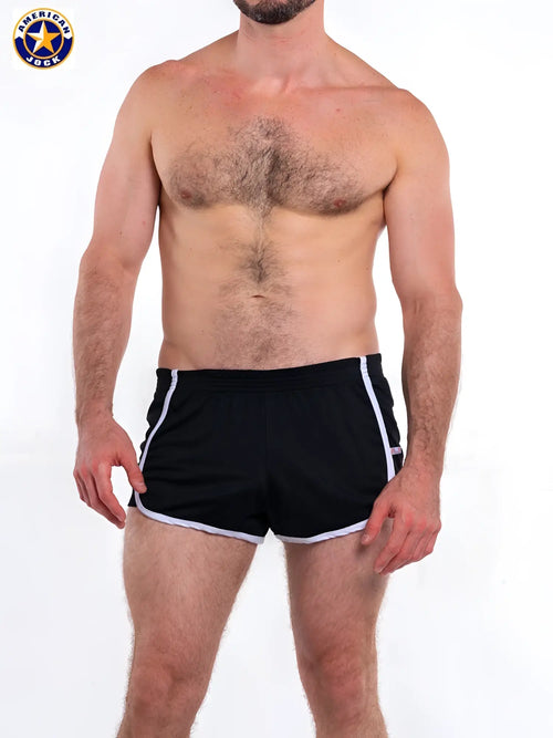 A j basics 8 inch black athletic shorts with white side stripes and matching hem in a classic sporty design