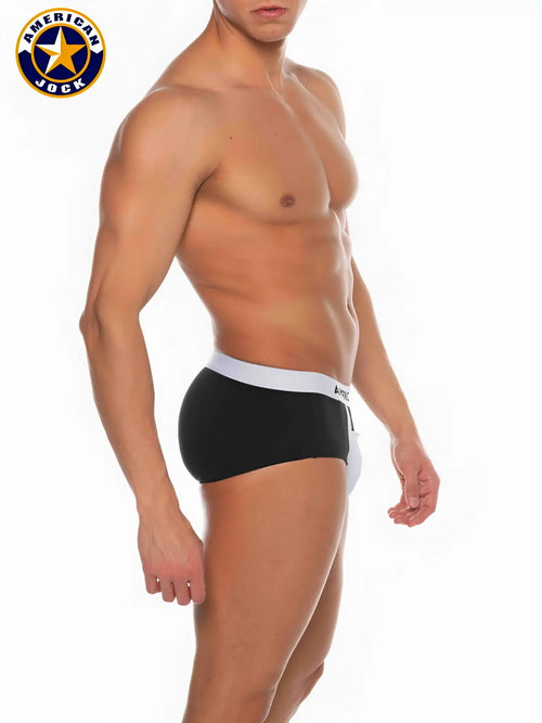 A j basics full cut brief in black with a white waistband and brand logo on black american jock briefs