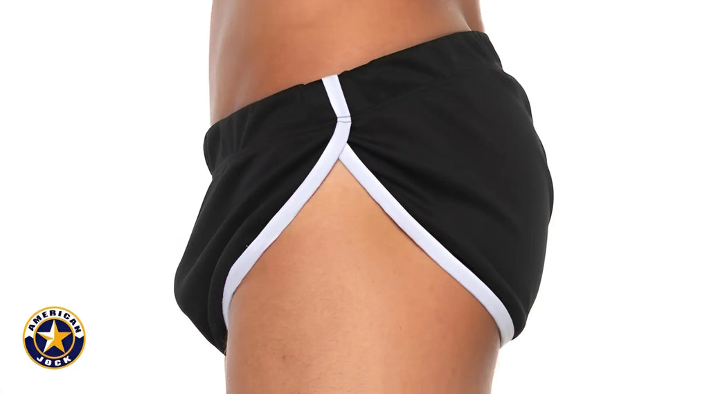Black american jock shorts with white piping along sides and waistband in aj basics side split short design