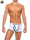 White american jock boxer briefs with black trim and bold stylized logo on waistband from a j basics trunk