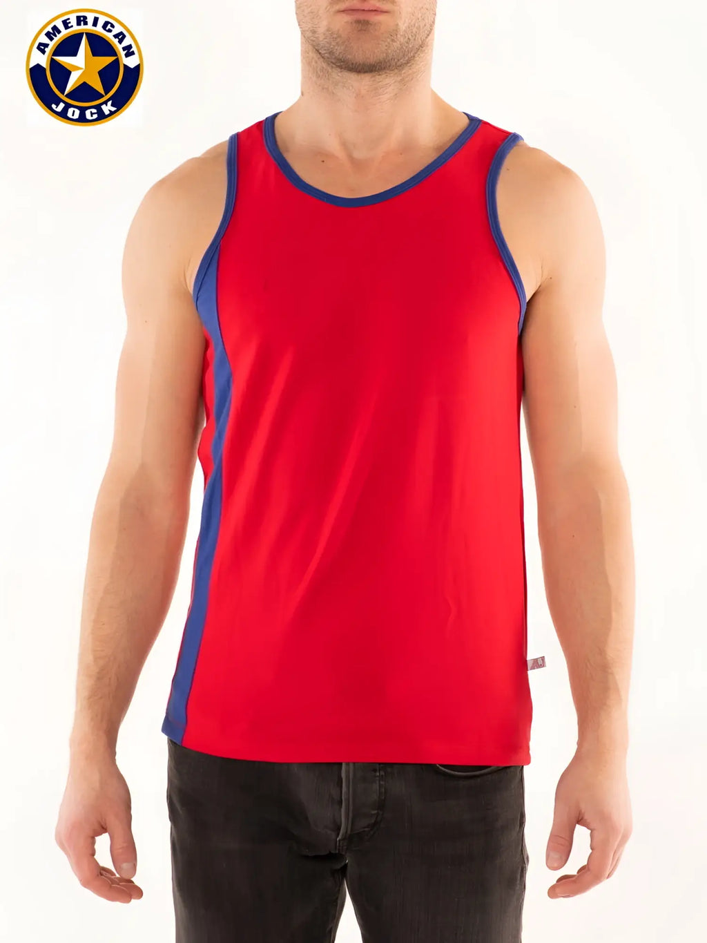 A j competitor tank top in red with blue trim along the neckline and side seams made from breathable fabric