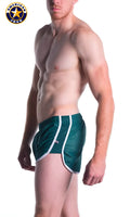 Green A J Decathlon athletic shorts with white side stripes and subtle textured pattern for active use