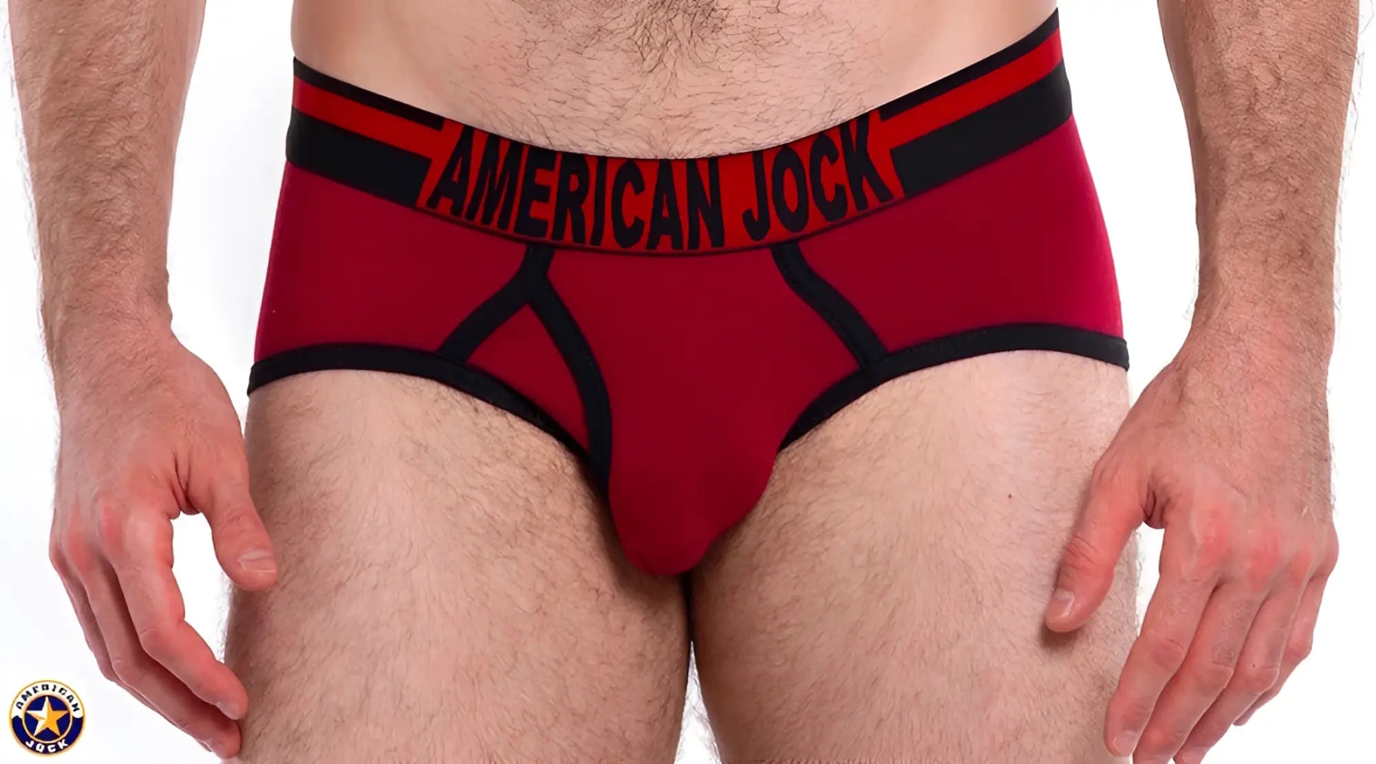 Red american jock briefs with black trim and bold lettering on the waistband from a j gym brief collection