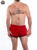 Red american jock athletic shorts with black trim featuring a liner designed for gym and jogging use