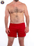 Red american jock swim trunks with built-in jockstrap designed for gym wear and active use